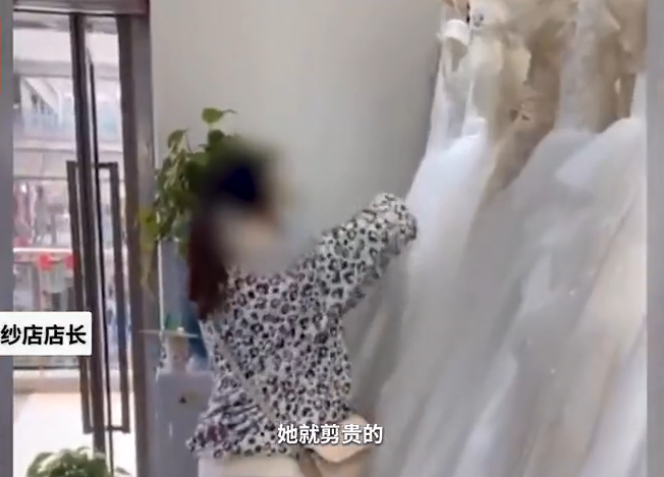孕妇在婚纱店怒剪32件婚纱 造成直接经济损失近7万元